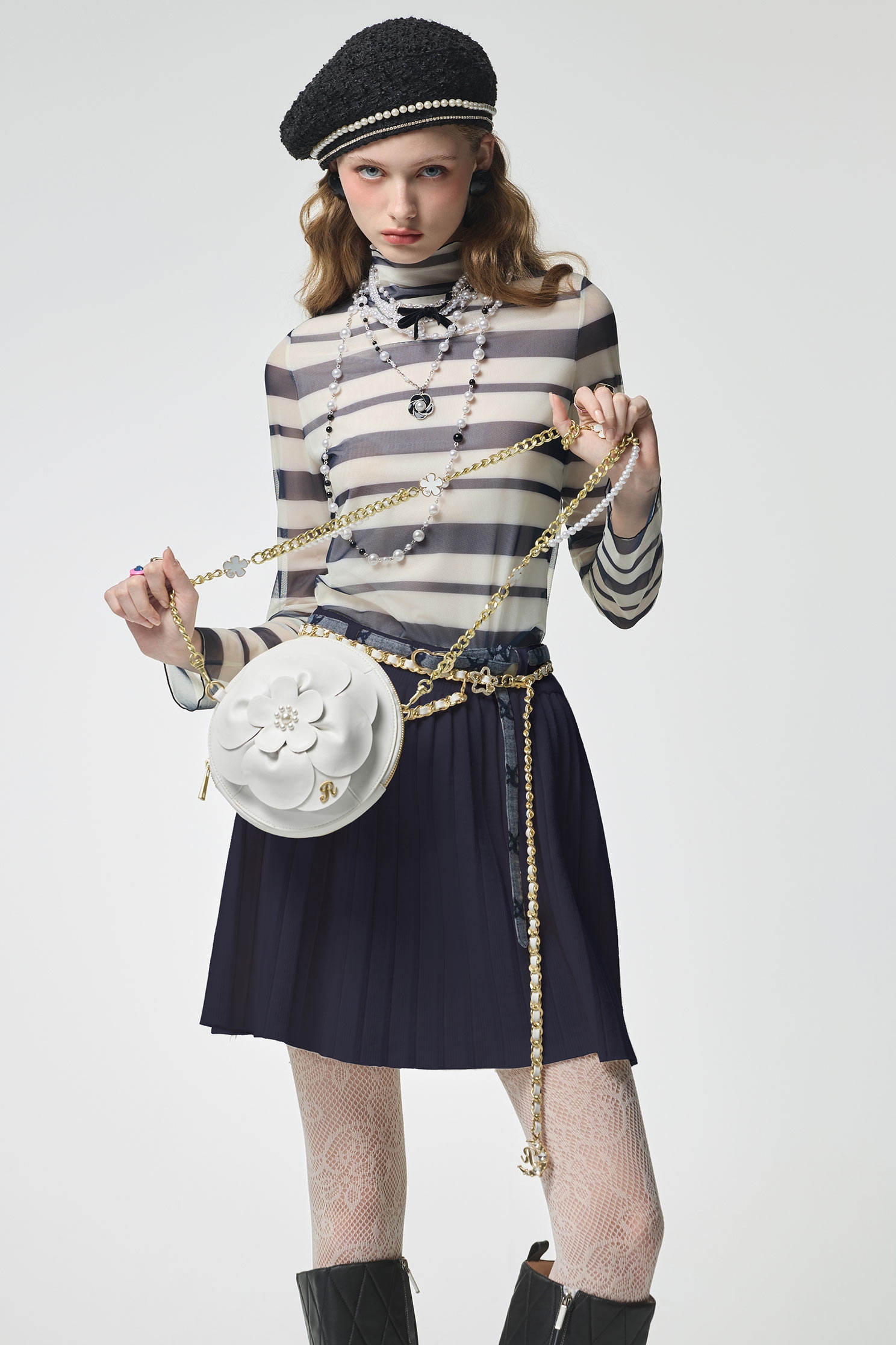 百摺造型針織短裙百摺造型針織短裙,上班OL穿搭,百摺裙,短裙,秋冬穿搭,約會特輯,腰帶,針織