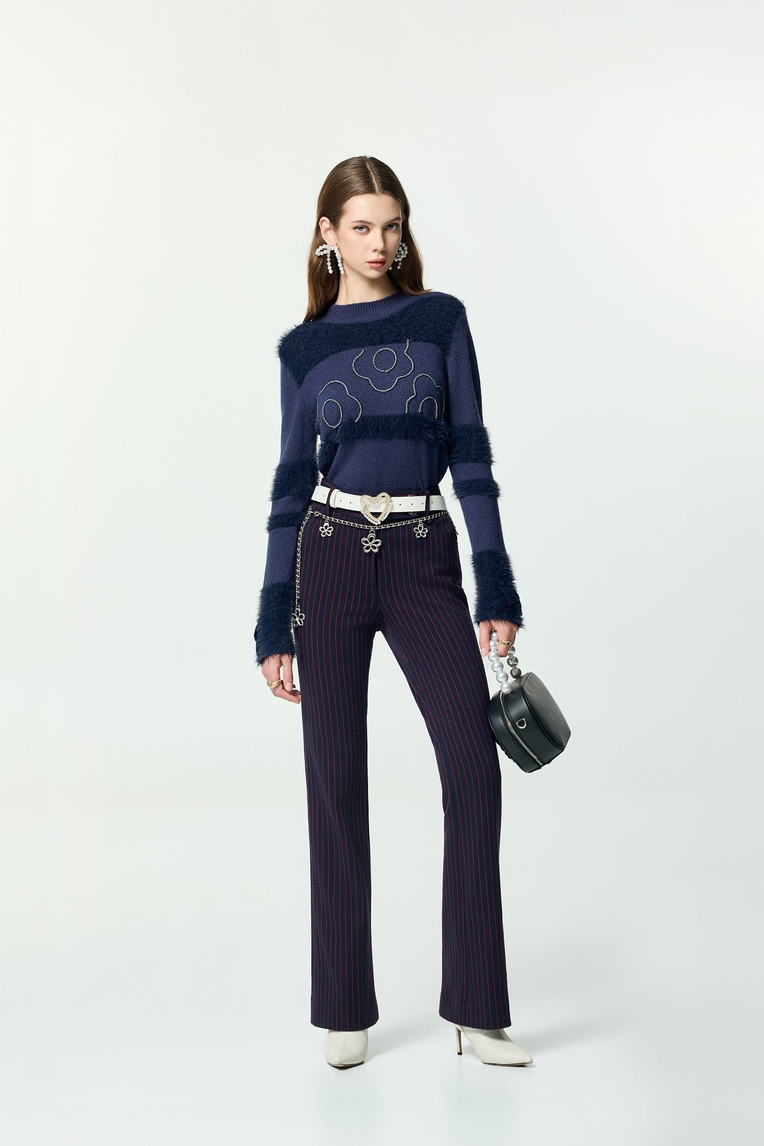 火焰色條紋喇叭長褲火焰色條紋喇叭長褲,喇叭褲,條紋,秋冬穿搭,褲子,針織