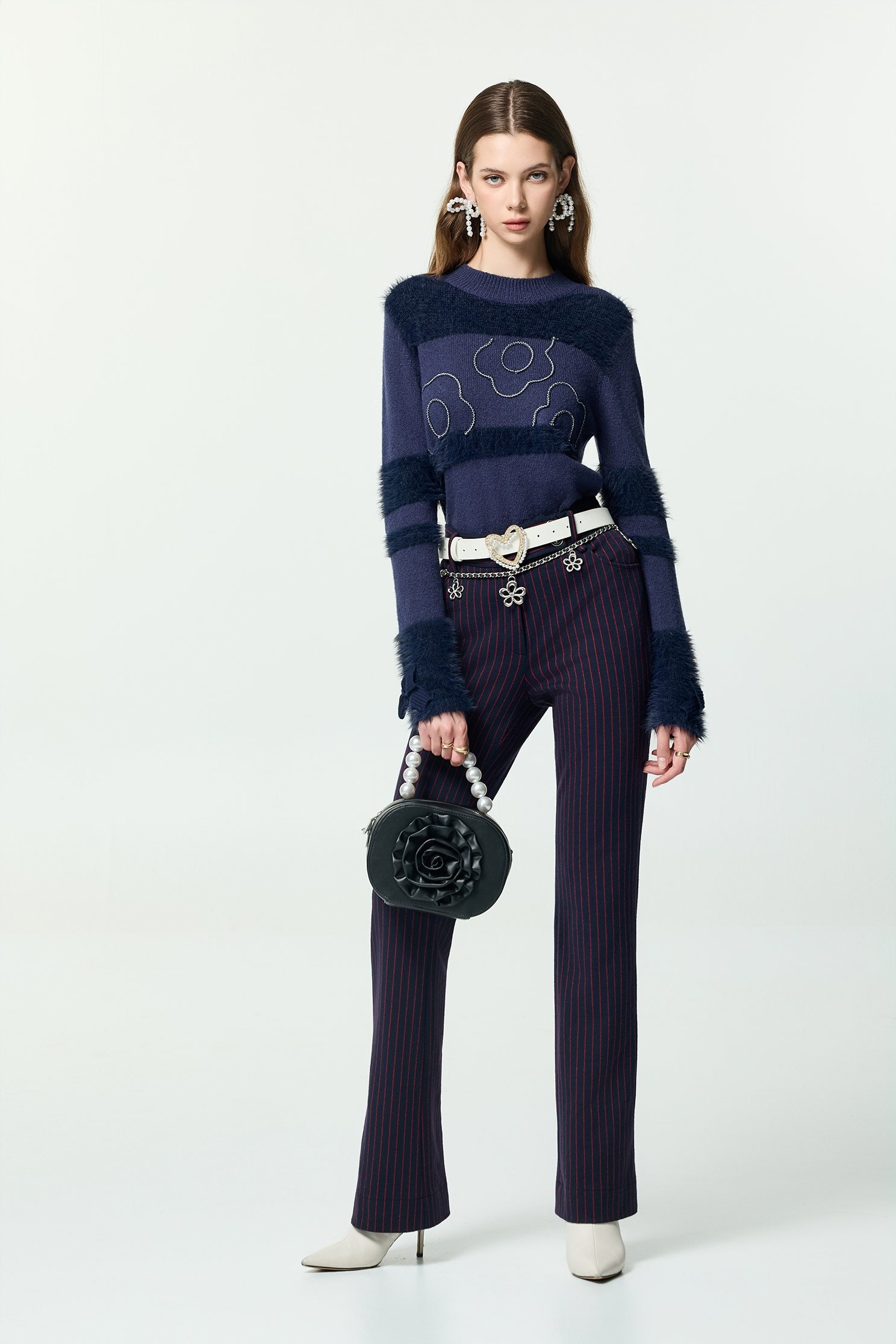 火焰色條紋喇叭長褲火焰色條紋喇叭長褲,喇叭褲,條紋,秋冬穿搭,褲子,針織