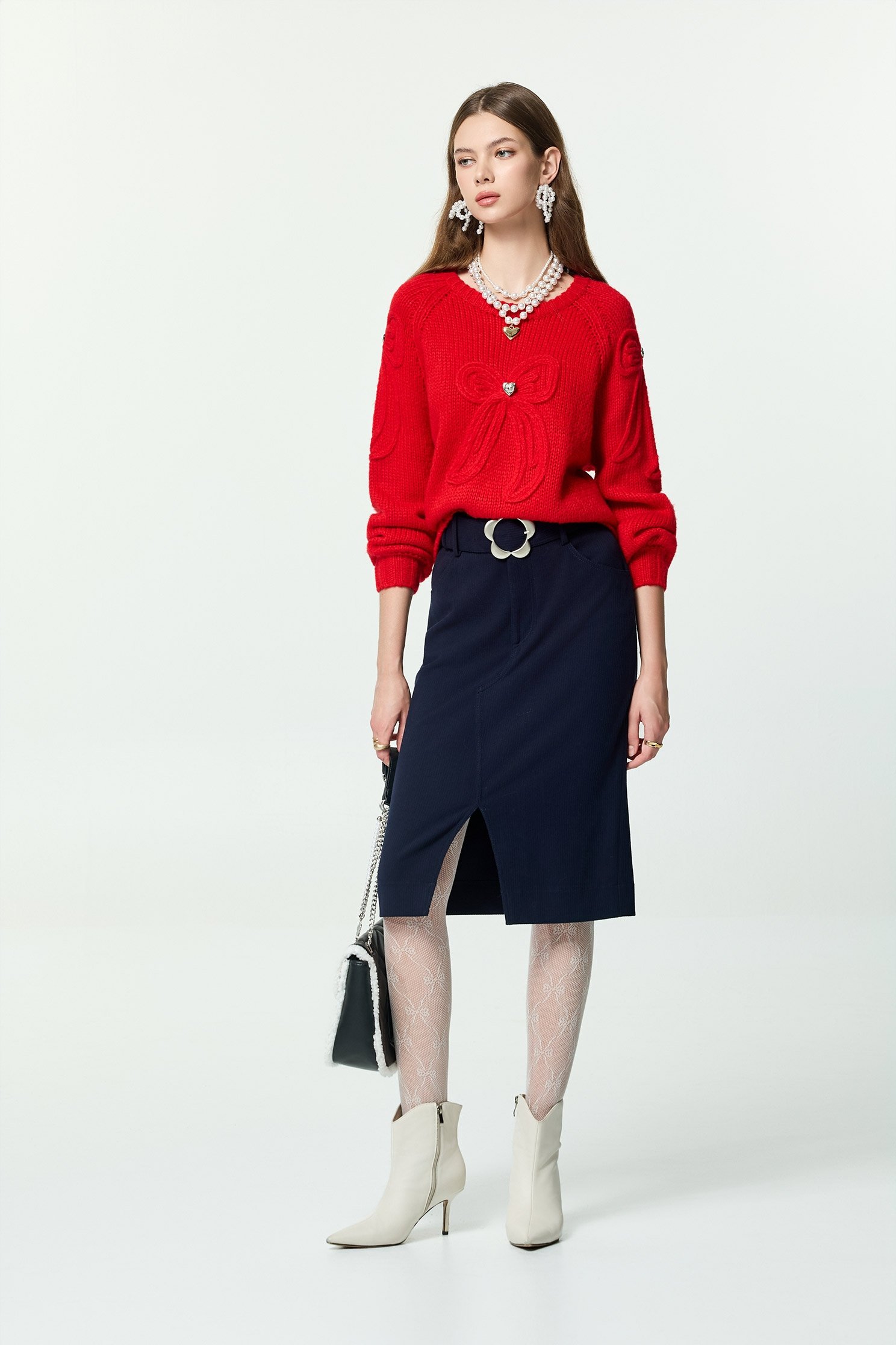 火焰色綴蝴蝶結針織上衣火焰色綴蝴蝶結針織上衣,上衣,秋冬穿搭,蝴蝶結,針織,針織衫