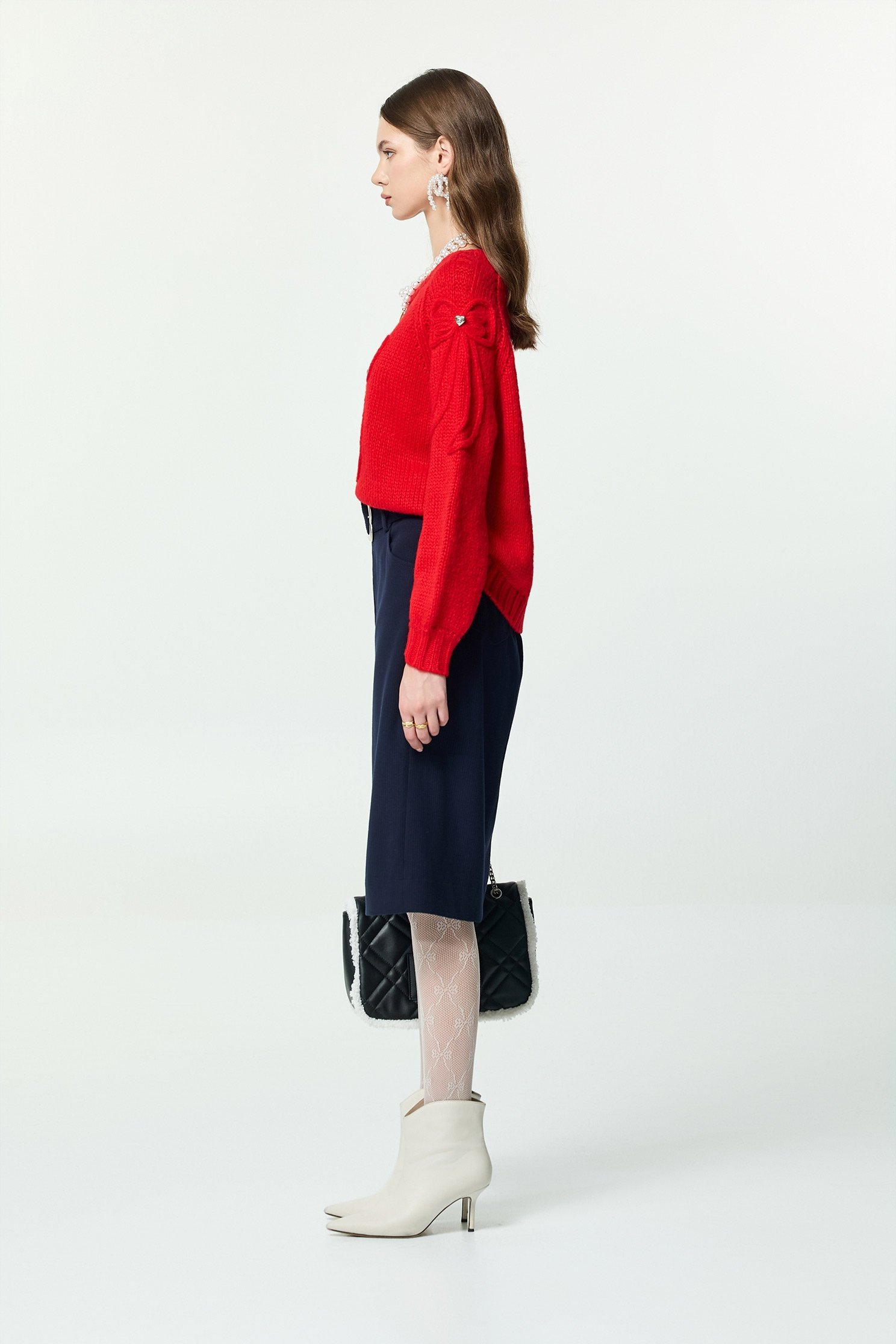 火焰色綴蝴蝶結針織上衣火焰色綴蝴蝶結針織上衣,上衣,秋冬穿搭,蝴蝶結,針織,針織衫