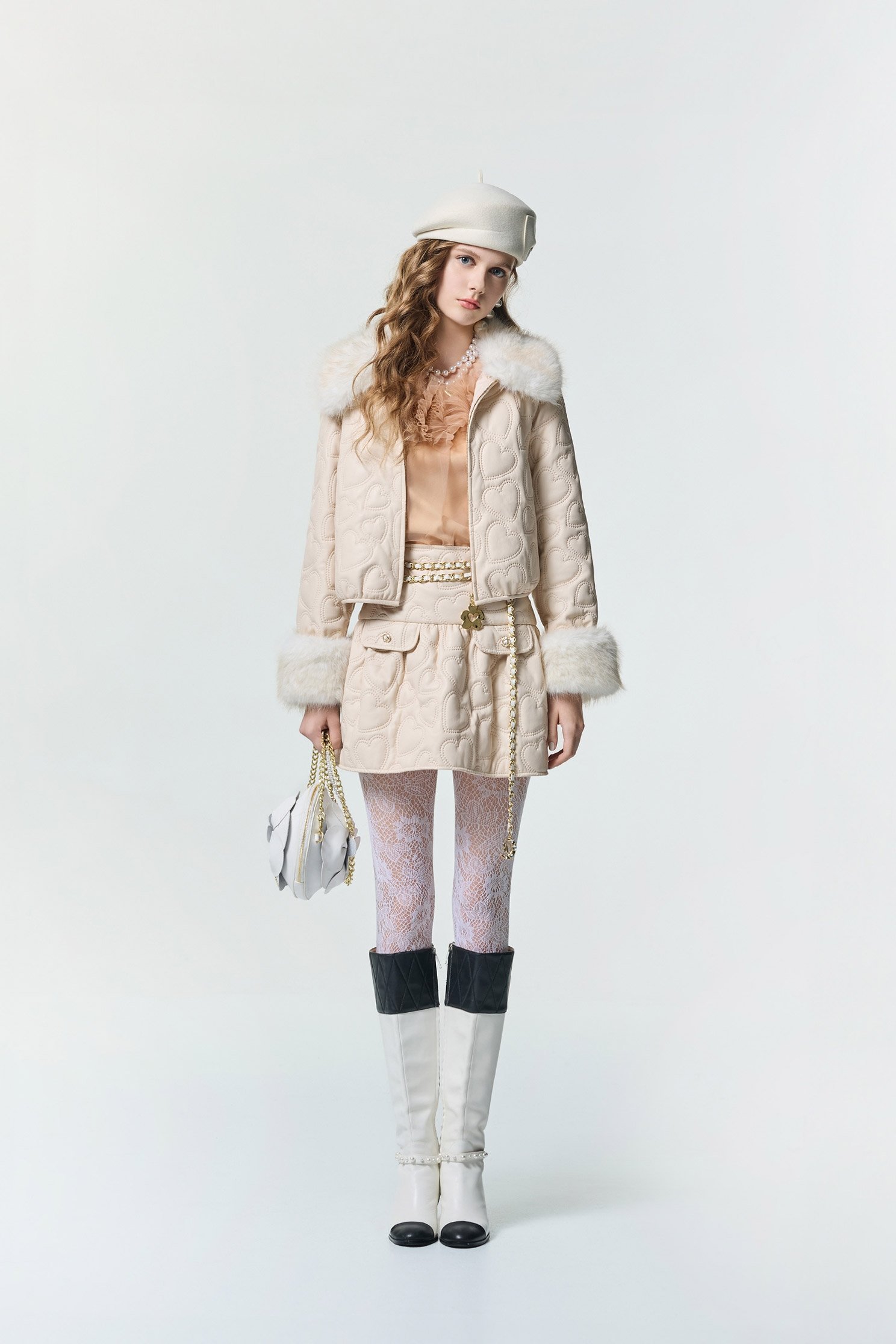 愛心圖騰絎縫仿皮短裙愛心圖騰絎縫仿皮短裙,春夏穿搭,短裙