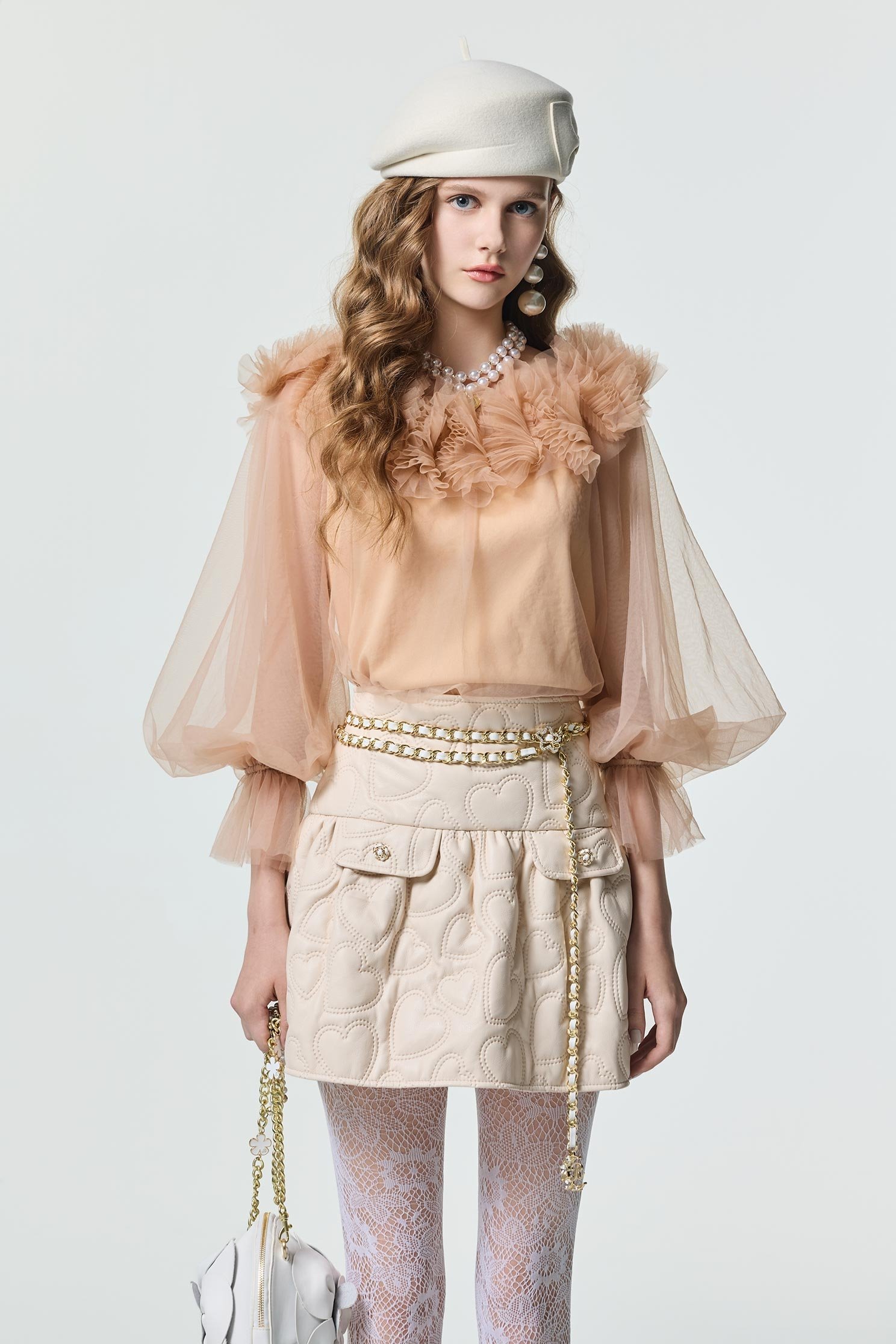 愛心圖騰絎縫仿皮短裙愛心圖騰絎縫仿皮短裙,春夏穿搭,短裙