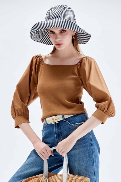 焦糖色拼接袖針織上衣